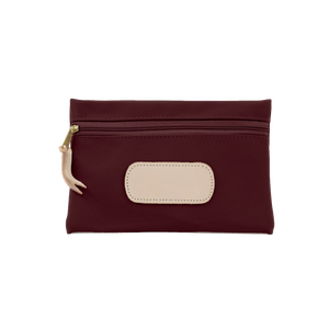 Pouch - Burgundy Coated Canvas Front Angle in Color 'Burgundy Coated Canvas'