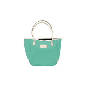 Medium Holiday Tote - Mint Coated Canvas Front Angle in Color 'Mint Coated Canvas'