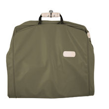 Load image into Gallery viewer, 50&quot; Garment Bag - Moss Coated Canvas Front Angle in Color &#39;Moss Coated Canvas&#39;
