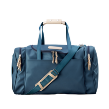 Load image into Gallery viewer, Medium Square Duffel - French Blue Coated Canvas Front Angle in Color 'French Blue Coated Canvas'