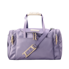 Load image into Gallery viewer, Medium Square Duffel - Lilac Coated Canvas Front Angle in Color &#39;Lilac Coated Canvas&#39;
