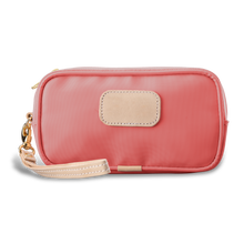 Load image into Gallery viewer, Wristlet - Coral Coated Canvas Front Angle in Color &#39;Coral Coated Canvas&#39;
