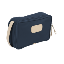 Load image into Gallery viewer, Small Travel Kit - Navy Coated Canvas Front Angle in Color 'Navy Coated Canvas'