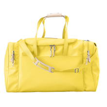Load image into Gallery viewer, Large Square Duffel - Lemon Coated Canvas Front Angle in Color 'Lemon Coated Canvas'
