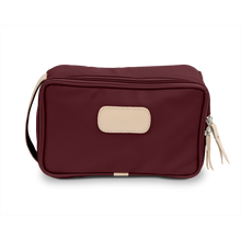 Load image into Gallery viewer, Small Travel Kit - Burgundy Coated Canvas Front Angle in Color 'Burgundy Coated Canvas'