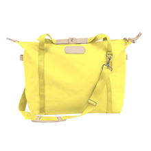 Load image into Gallery viewer, Daytripper - Lemon Coated Canvas Front Angle in Color 'Lemon Coated Canvas'