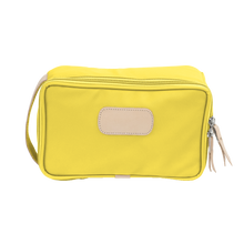 Load image into Gallery viewer, Small Travel Kit - Lemon Coated Canvas Front Angle in Color 'Lemon Coated Canvas'