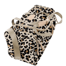 Load image into Gallery viewer, Small Square Duffel - Leopard Coated Canvas Front Angle in Color &#39;Leopard Coated Canvas&#39;
