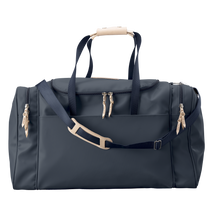 Load image into Gallery viewer, Large Square Duffel - Navy Coated Canvas Front Angle in Color 'Navy Coated Canvas'