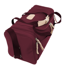 Load image into Gallery viewer, Small Square Duffel - Burgundy Coated Canvas Front Angle in Color 'Burgundy Coated Canvas'