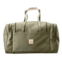 Load image into Gallery viewer, Large Square Duffel - Moss Coated Canvas Front Angle in Color 'Moss Coated Canvas'