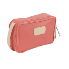 Load image into Gallery viewer, Small Travel Kit - Coral Coated Canvas Front Angle in Color 'Coral Coated Canvas'
