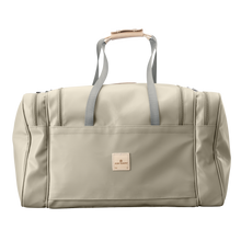 Load image into Gallery viewer, Large Square Duffel - Tan Coated Canvas Front Angle in Color 'Tan Coated Canvas'