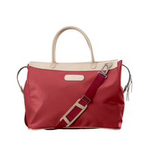 Load image into Gallery viewer, Burleson Bag - Red Coated Canvas Front Angle in Color 'Red Coated Canvas'