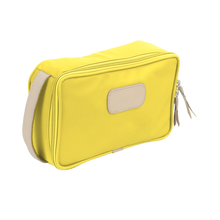 Load image into Gallery viewer, Small Travel Kit - Lemon Coated Canvas Front Angle in Color 'Lemon Coated Canvas'