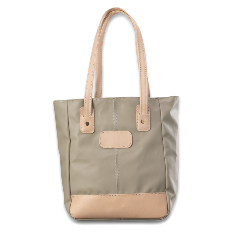 Quality made in America lined durable coated canvas and natural leather tote bag with outside pocket and leather patch to personalize with initials or monogram