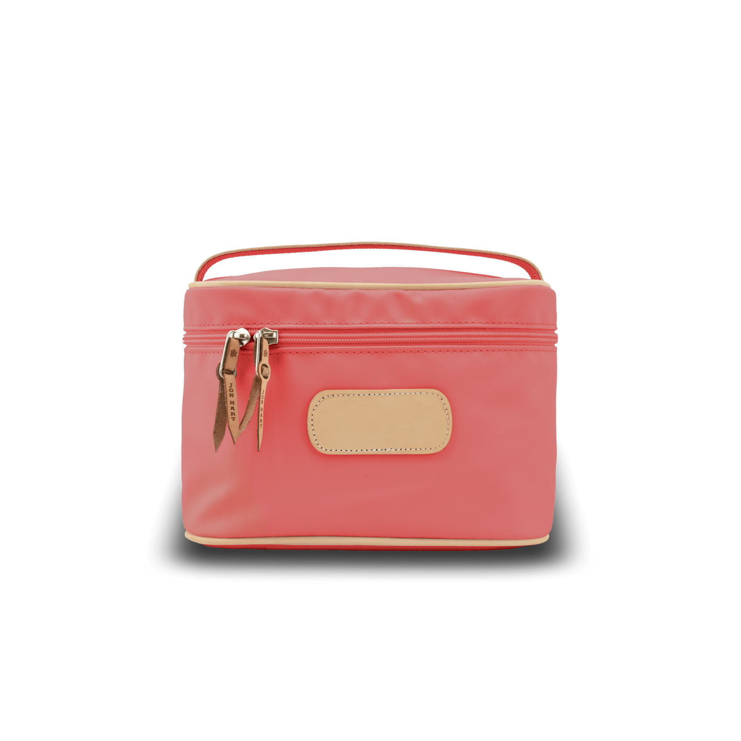 Makeup Case - Coral Coated Canvas Front Angle in Color 'Coral Coated Canvas'