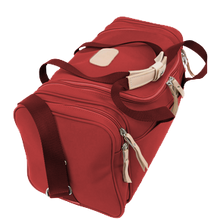 Load image into Gallery viewer, Small Square Duffel - Red Coated Canvas Front Angle in Color 'Red Coated Canvas'