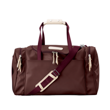 Load image into Gallery viewer, Medium Square Duffel - Burgundy Coated Canvas Front Angle in Color &#39;Burgundy Coated Canvas&#39;
