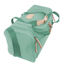 Load image into Gallery viewer, Small Square Duffel - Mint Coated Canvas Front Angle in Color 'Mint Coated Canvas'