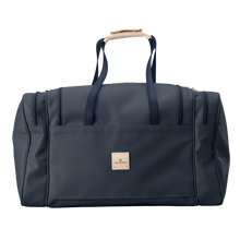 Load image into Gallery viewer, Large Square Duffel - Navy Coated Canvas Front Angle in Color &#39;Navy Coated Canvas&#39;
