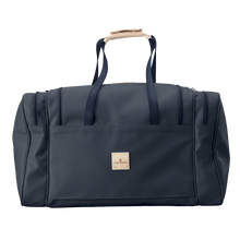 Load image into Gallery viewer, Large Square Duffel - Navy Coated Canvas Front Angle in Color 'Navy Coated Canvas'