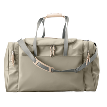 Load image into Gallery viewer, Large Square Duffel - Tan Coated Canvas Front Angle in Color 'Tan Coated Canvas'