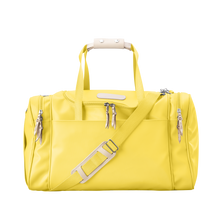 Load image into Gallery viewer, Medium Square Duffel - Lemon Coated Canvas Front Angle in Color 'Lemon Coated Canvas'