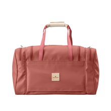 Load image into Gallery viewer, Medium Square Duffel - Coral Coated Canvas Front Angle in Color 'Coral Coated Canvas'