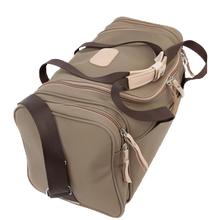 Load image into Gallery viewer, Small Square Duffel - Saddle Coated Canvas Front Angle in Color 'Saddle Coated Canvas'