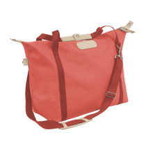 Load image into Gallery viewer, Daytripper - Coral Coated Canvas Front Angle in Color 'Coral Coated Canvas'