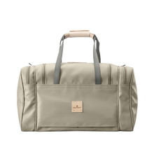 Load image into Gallery viewer, Medium Square Duffel - Tan Coated Canvas Front Angle in Color 'Tan Coated Canvas'