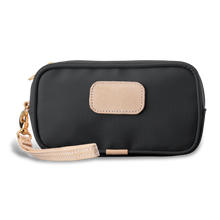 Load image into Gallery viewer, Wristlet - Charcoal Coated Canvas Front Angle in Color 'Charcoal Coated Canvas'