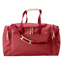 Load image into Gallery viewer, Large Square Duffel - Red Coated Canvas Front Angle in Color &#39;Red Coated Canvas&#39;
