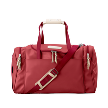 Load image into Gallery viewer, Medium Square Duffel - Red Coated Canvas Front Angle in Color 'Red Coated Canvas'