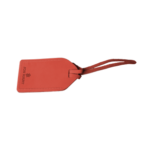Luggage Tag - Salmon Leather Front Angle in Color 'Salmon Leather'
