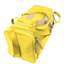 Load image into Gallery viewer, Small Square Duffel - Lemon Coated Canvas Front Angle in Color 'Lemon Coated Canvas'