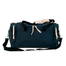 Load image into Gallery viewer, Small Square Duffel - Navy Coated Canvas Front Angle in Color &#39;Navy Coated Canvas&#39;
