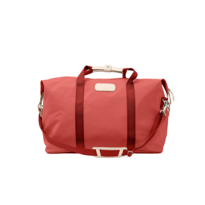 Weekender - Coral Coated Canvas Front Angle in Color 'Coral Coated Canvas'