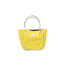 Load image into Gallery viewer, Medium Holiday Tote - Lemon Coated Canvas Front Angle in Color &#39;Lemon Coated Canvas&#39;
