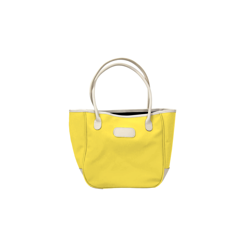 Medium Holiday Tote - Lemon Coated Canvas Front Angle in Color 'Lemon Coated Canvas'