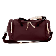 Load image into Gallery viewer, Small Square Duffel - Burgundy Coated Canvas Front Angle in Color &#39;Burgundy Coated Canvas&#39;
