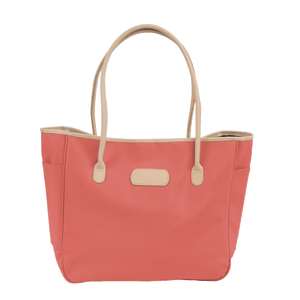 Tyler Tote - Coral Coated Canvas Front Angle in Color 'Coral Coated Canvas'