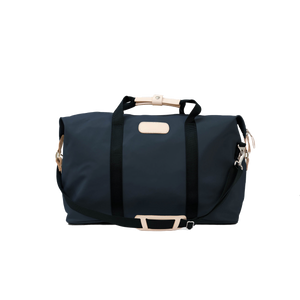 Weekender - Navy Coated Canvas Front Angle in Color 'Navy Coated Canvas'