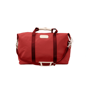 Weekender - Red Coated Canvas Front Angle in Color 'Red Coated Canvas'