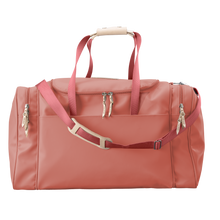 Load image into Gallery viewer, Large Square Duffel - Coral Coated Canvas Front Angle in Color &#39;Coral Coated Canvas&#39;
