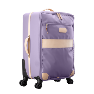 Large 360 wheeled luggage diagonal view in Color 'Lilac Coated Canvas'