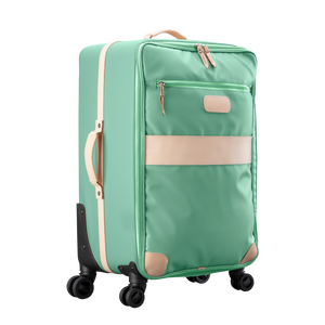 Large 360 wheeled luggage diagonal view in Color 'Mint Coated Canvas'