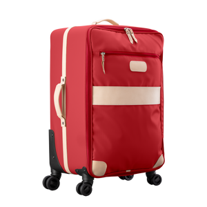 Large 360 wheeled luggage diagonal view in Color 'Red Coated Canvas'