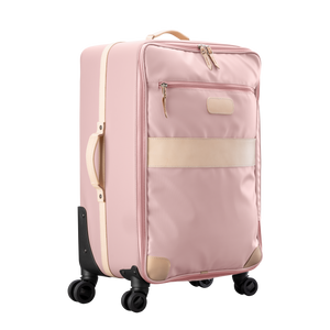 Large 360 wheeled luggage diagonal view in Color 'Rose Coated Canvas'